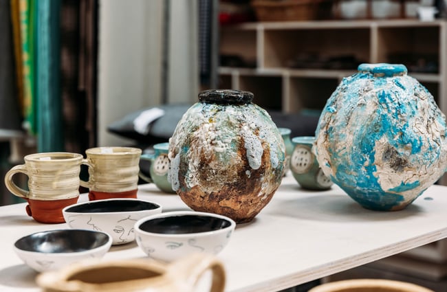Close up of ceramic vases with ocean-inspired foamy textures