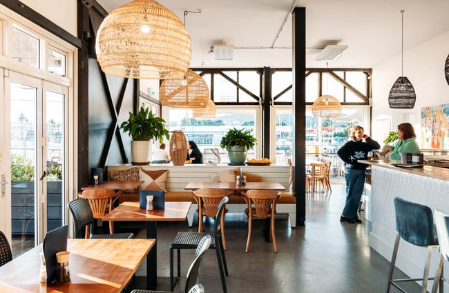 The sunny interior of a restaurant in Gisborne.