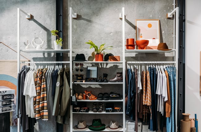 Racks of clothing and shoes at Cre8iveworx.