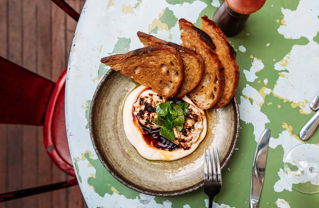 Food dish on the table at Cuba St Tavern.
