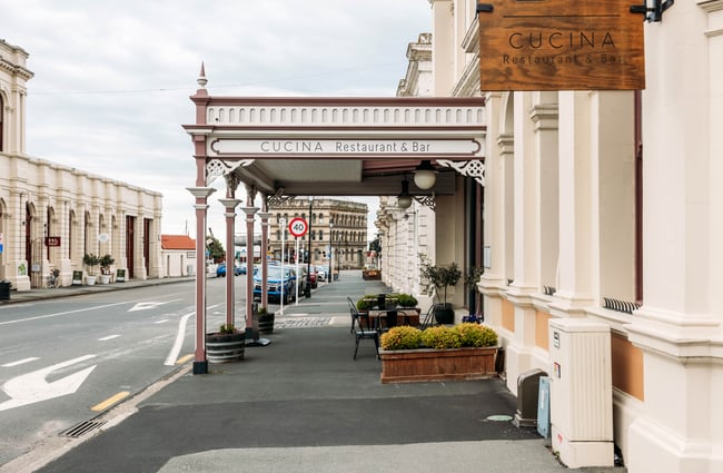 Streetview of Cucina Restaurant in Ōamaru surrounded by historic stone buildings