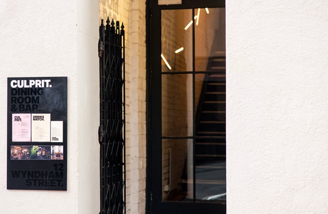 The black and white entrance to Culprit in Auckland.