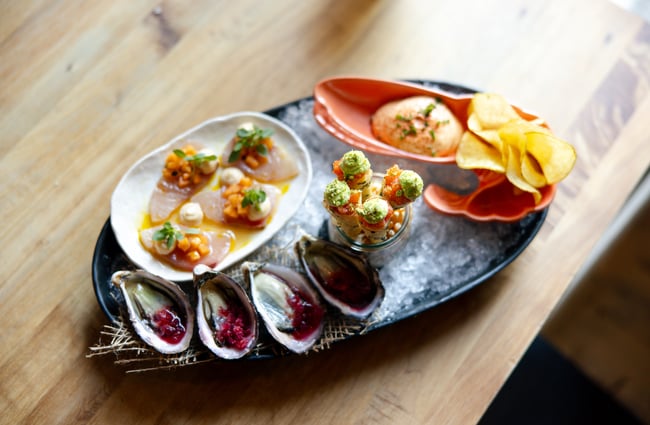 A plate of seafood on a table.