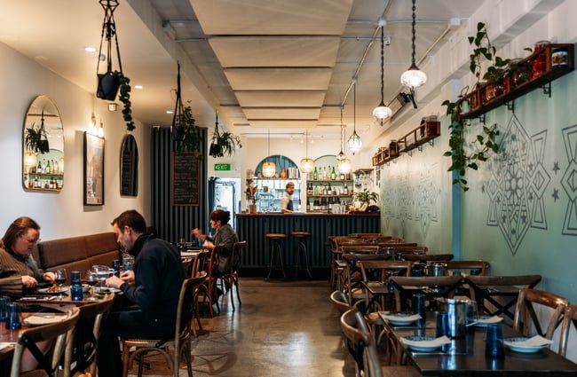 Customers in the dining room at Damascus.