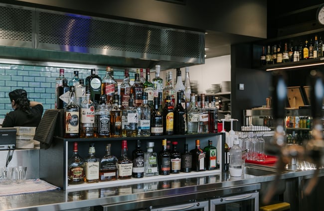 Spirits behind the bar at Dark Sky Diner, Tekapo.