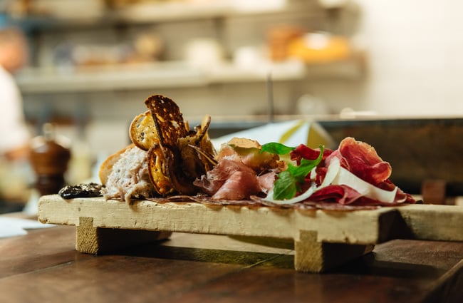 Food on wooden boards.
