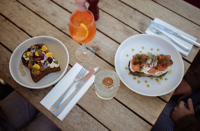 Brunch and cocktails on table at Dishery in Arrowtown Queenstown