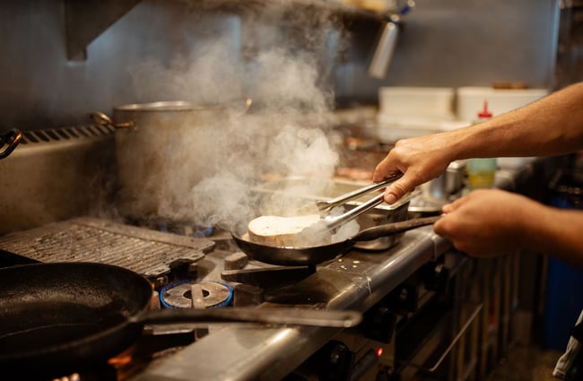 Cooking in the kitchen at The Dishery