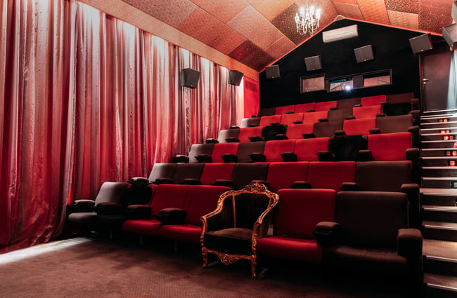 Red seating inside a cinema.