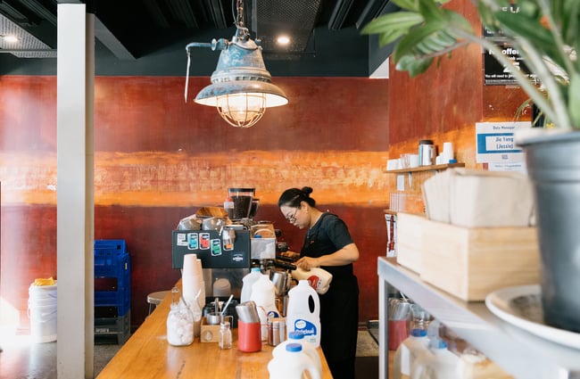 Barista making coffee at Dose Diner in Christchurch