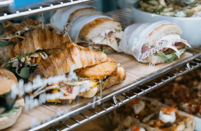 Close up of croissant and sandwich in cabinet at Dose Diner in Christchurch