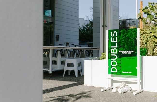 The clear green Doubles sign.