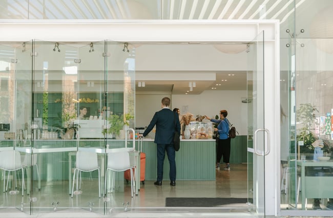 The glass entrance to Doubles cafe.