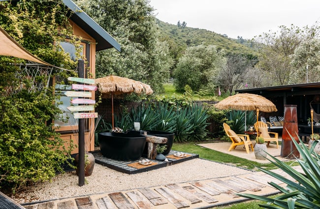 An outdoor seating area at a glamping site.