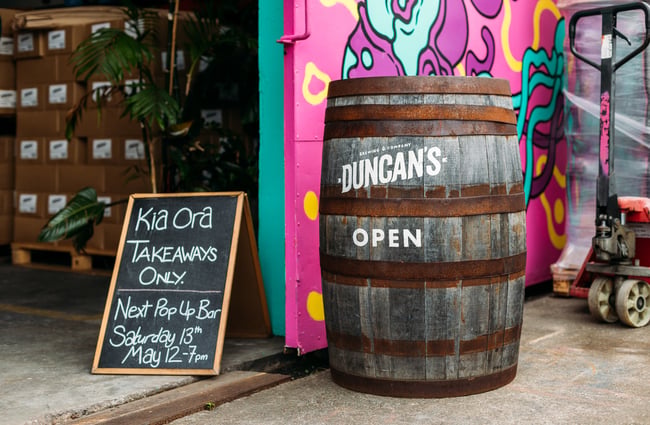 A Duncan's sign on a wine barrel.