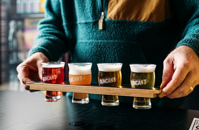 A close up of beers in a row.