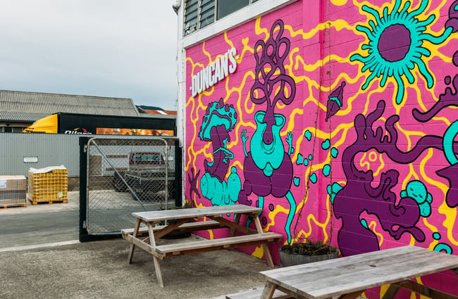 A seating area outside the Duncan's building.