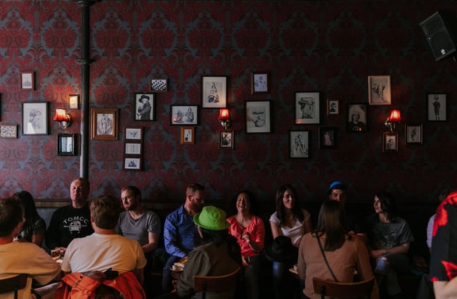 Big group of friends socialising at The Poplar Social Club, Christchurch.