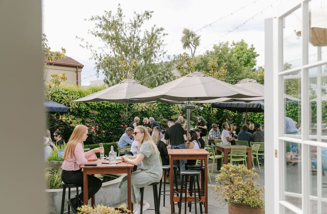 Wide angle of the courtyard garden at Dux Dine, Christchurch.