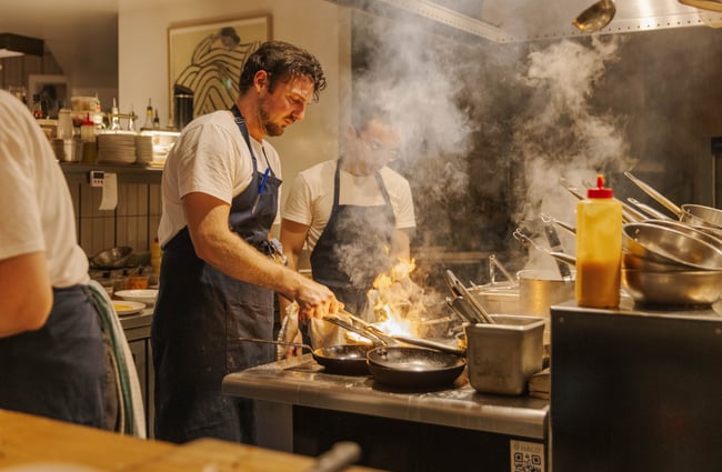 Chefs at work in the kitchen at Earl.
