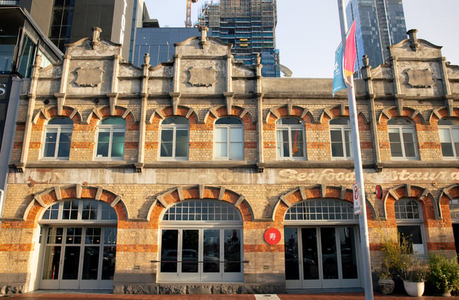 A large brick building on a sunny day in Auckland.