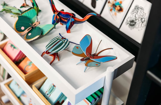 Close up of butterfly decor at Eclectic Design House in Petone
