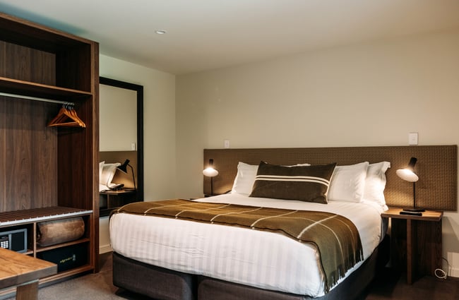 Bed in the hotel room at Edgewater Hotel.