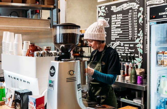 Barista behind the machine at Elemental Eats.