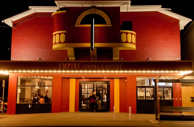 Red and gold exterior of Empire Cinema.