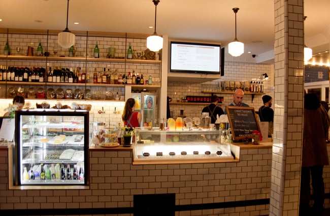 White tiled front counter.