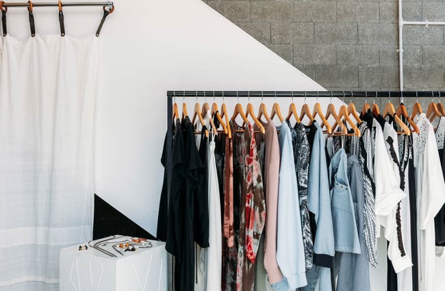 Clothes on a rack.