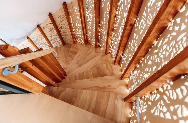 A view of a wooden staircase.