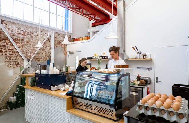 Staff working behind the counter at Estelle.