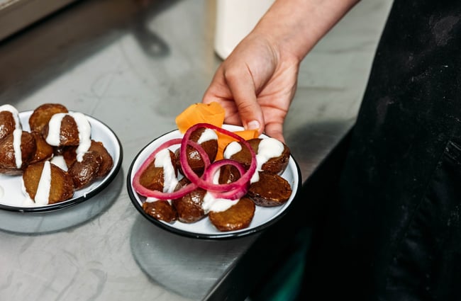 Plates being prepared at Everybody Eats.