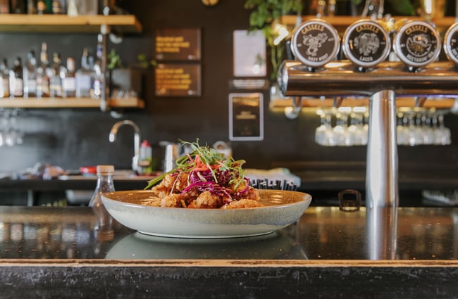 Fried chicken in a bowl on a table.