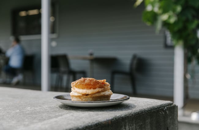 Close up of a pie on a table at Fairlie Bakehouse.