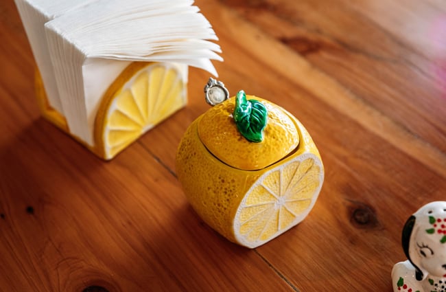 Lemon shaped sugar bowl on cafe table