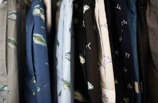 Close up of clothing with fish patterns.