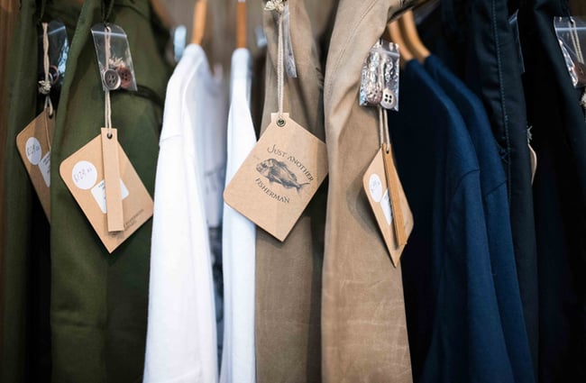 Brown Just Another Fisherman tags on clothing.