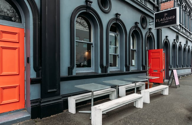 The large grey exterior of Flagship Eatery Gisborne.