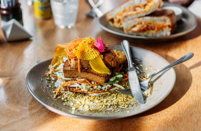 A colourful salad on a plate.