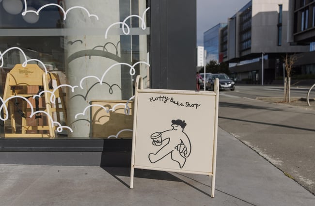 Fluffy Bake Shop sign outside the bakery.