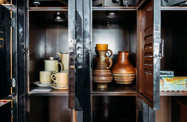 Brown vases on display inside Forfar Road Gallery Roxburgh Central Otago.