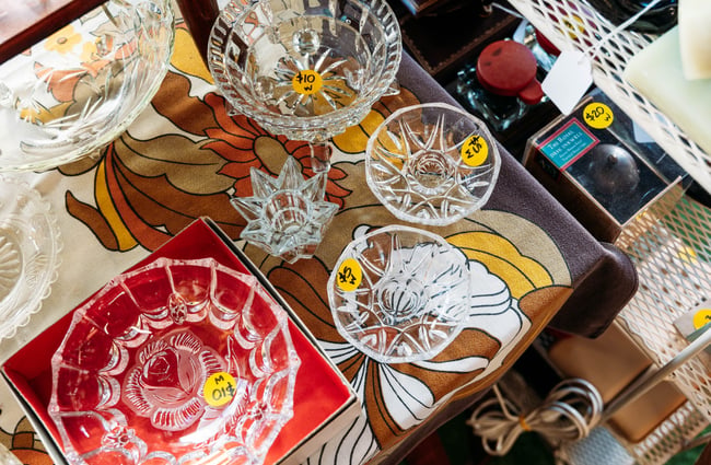 A close up of vintage glasses on a table.