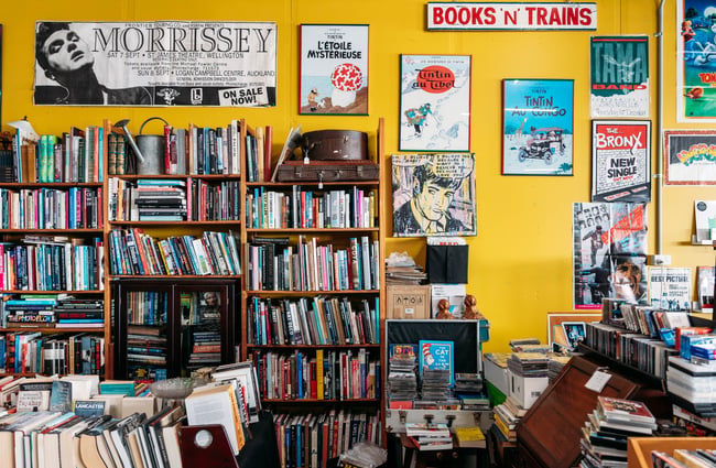 Art and records on display inside Fossick Collectables Hamilton.