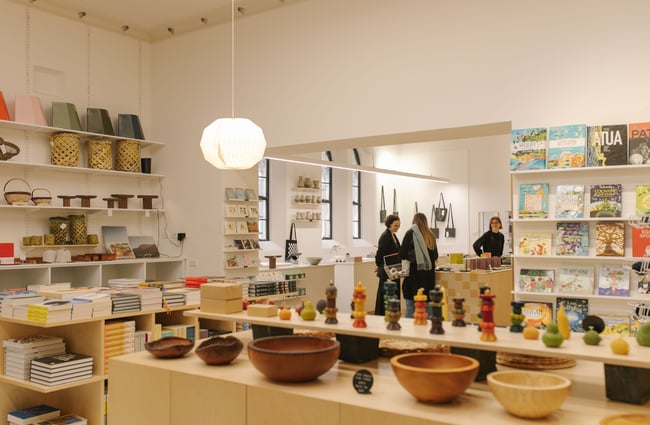 Customers browsing the shelves and displays at Frances Nation Home.