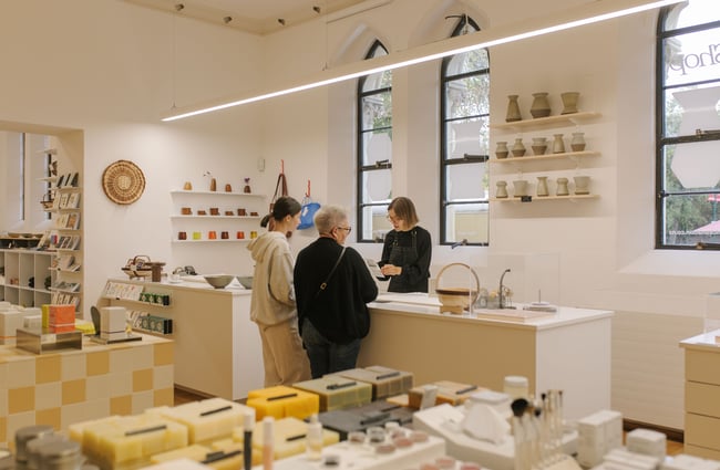 Customers at the counter at Frances Nation Home.