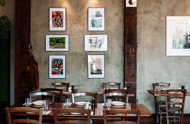 Table and chairs set up in the dining room at Francesca.