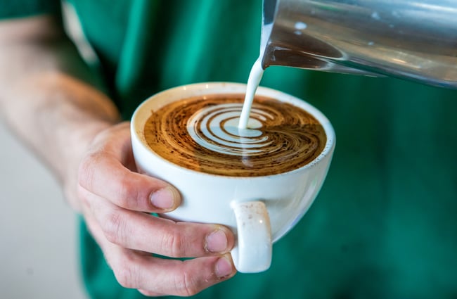 Coffee being poured at Frank.