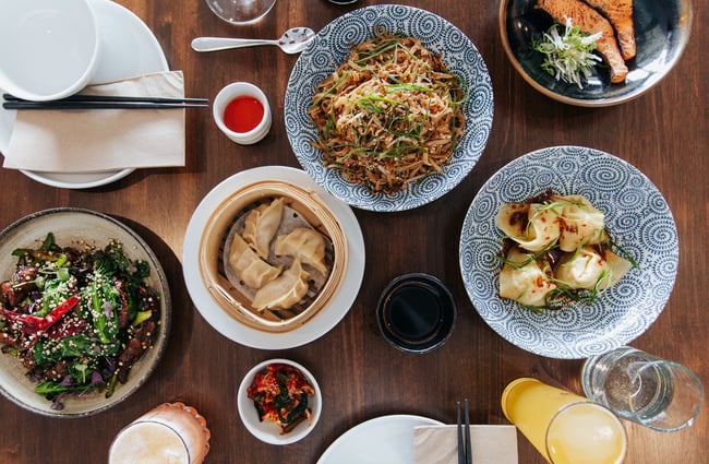 A flatlay of meals on a table.